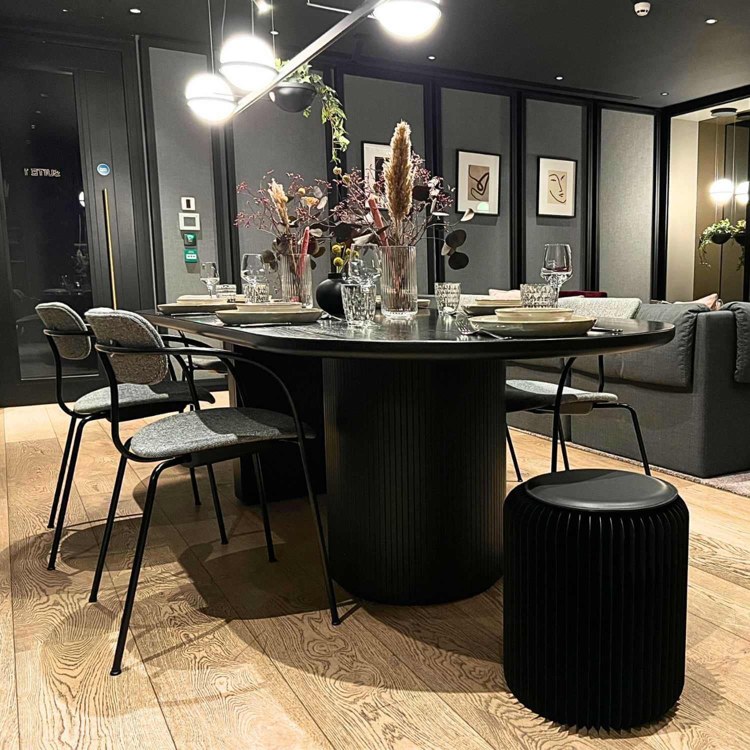 black foldable stool for extra guest dining table