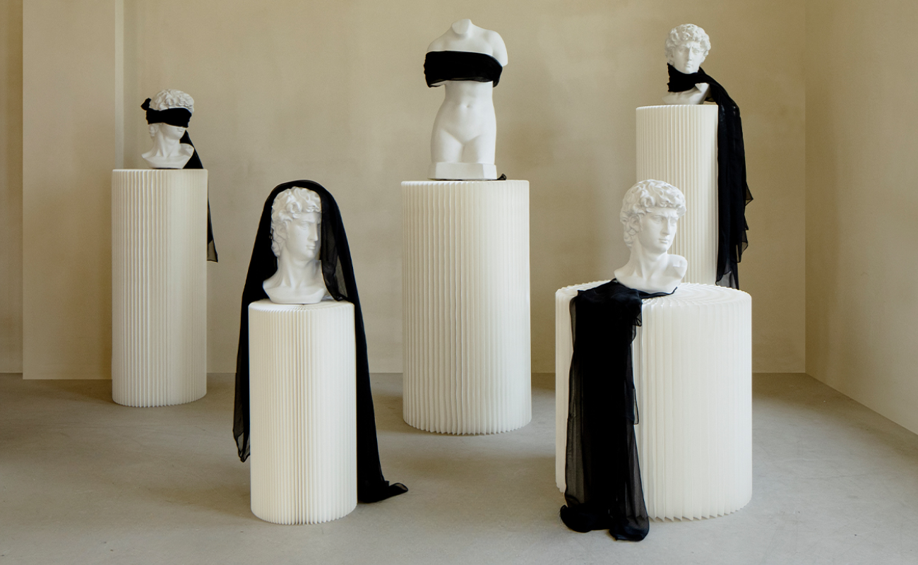 statue on origami style furniture minimalistic